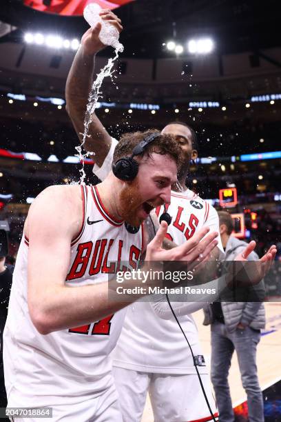 Onuralp Bitim of the Chicago Bulls gets a water celebration from Andre Drummond after the game against the Cleveland Cavaliers at the United Center...