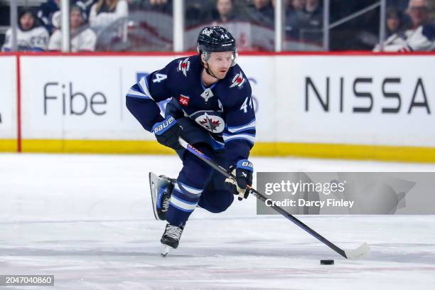 Josh Morrissey of the Winnipeg Jets carries the puck down the ice during second period action against the St. Louis Blues at the Canada Life Centre...