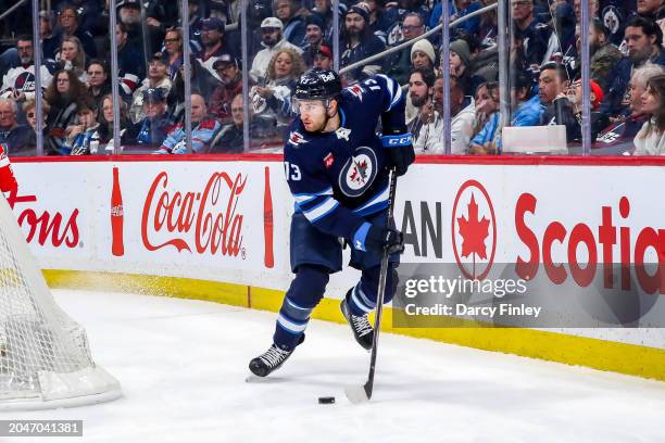 Gabriel Vilardi of the Winnipeg Jets plays the puck behind the net during third period action against the St. Louis Blues at the Canada Life Centre...