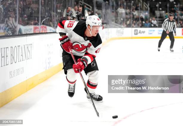 Ondrej Palat of the New Jersey Devils skates with the puck against the San Jose Sharks in the first period of an NHL hockey game at SAP Center on...