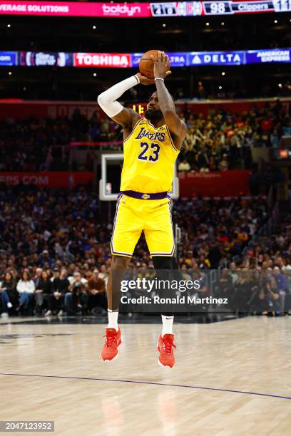 LeBron James of the Los Angeles Lakers takes a shot against the LA Clippers in the second half at Crypto.com Arena on February 28, 2024 in Los...