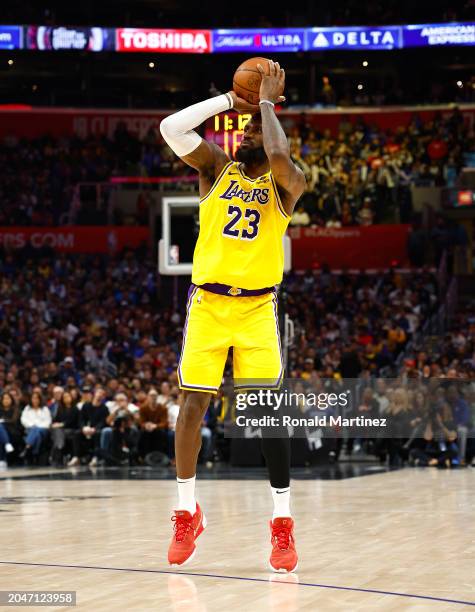 LeBron James of the Los Angeles Lakers takes a shot against the LA Clippers in the second half at Crypto.com Arena on February 28, 2024 in Los...