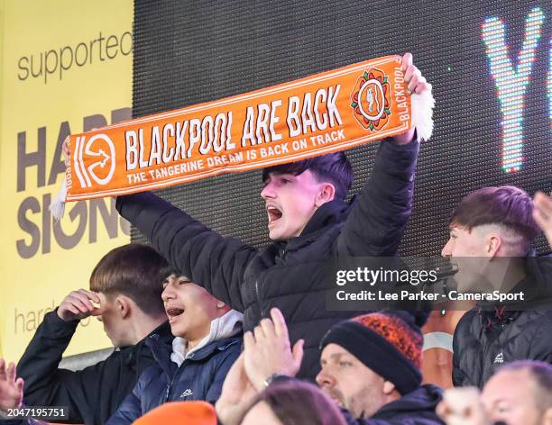 Blackpool fans applaud their team at the final whistle during the Sky Bet League One match between Shrewsbury Town and Blackpool at Montgomery Waters...