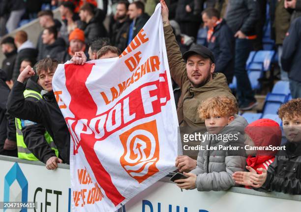 Blackpool fans applaud their team at the final whistle during the Sky Bet League One match between Shrewsbury Town and Blackpool at Montgomery Waters...