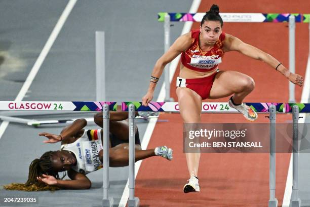 Belgium's Yanla Ndjip-Nyemeck falls next to Spain's Xenia Benach during the Women's 60m hurdles heats during the Indoor World Athletics Championships...