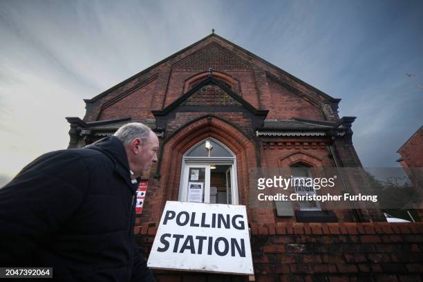 Voter leaves a polling station after voting in the Rochdale by-election on February 29, 2024 in Rochdale, England. The Rochdale by-election takes...