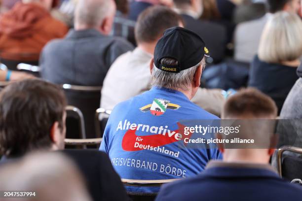 March 2024, Saxony-Anhalt, Magdeburg: "Alternative-Deutschland, Kreisverband Börde" is written on the T-shirt of a delegate at the state party...