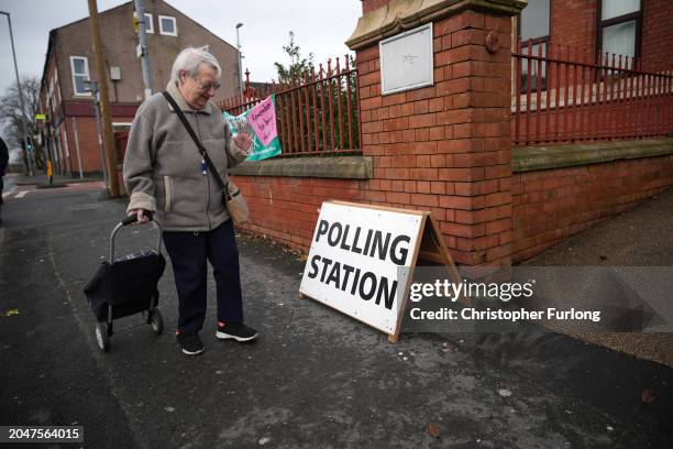 Voter arrives at a polling station to vote in the Rochdale by-election on February 29, 2024 in Rochdale, England. The Rochdale by-election takes...