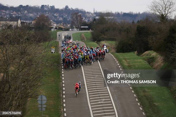 Riders compete in the first kilometers of the 1st stage of the Paris-Nice cycling race, 158 km between Les Mureaux and Les Mureaux, on March 3, 2024.