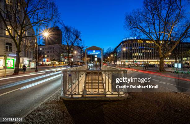 u-bahn sign uhlandstrasse  at night at kurfürstendamm - reinhard krull stock pictures, royalty-free photos & images