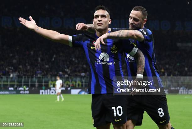 Lautaro Martinez of FC Internazionale celebrates with his team-mate Marko Arnautovic after scoring his team's second goal during the Serie A TIM...