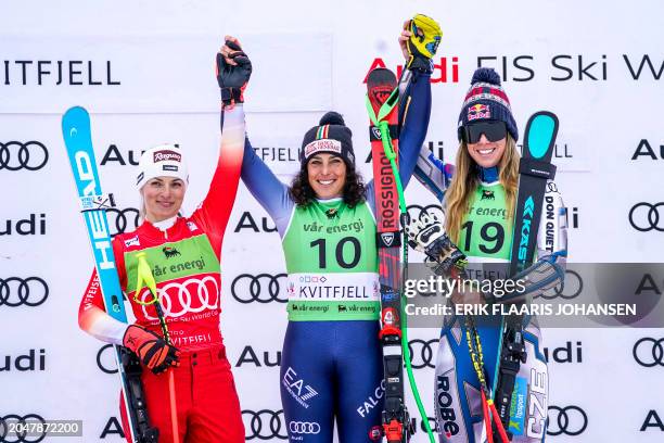 Winner Italy's Federica Brignone , third placed Czech Republic's Ester Ledecka and second placed Switzerland's Lara Gut-Behrami celebrate on the...