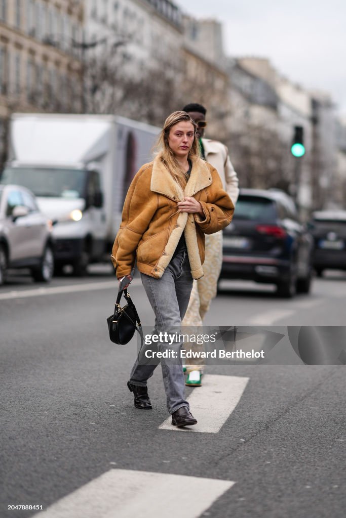 Street Style - Paris Fashion Week - Womenswear Fall/Winter 2024/2025 - Day Three