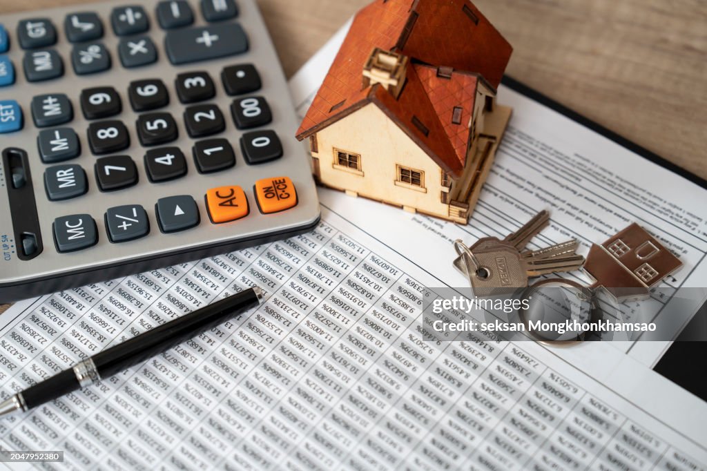 Money, pile coin with saving book and paper home,concept