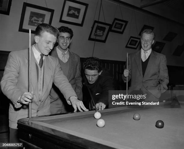 Tottenham Hotspur Football Club players, from left, wingers Terry Dyson and Micky Dulin and strikers Tommy Harmer and Alfie Stokes playing snooker at...