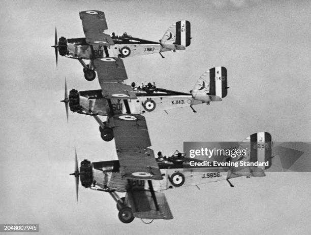 Flying formation of Westland Wapiti single engine biplane bombers, circa 1931.