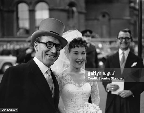 Comedian and actor Arthur Askey with his daughter, actress Anthea Askey during her wedding, March 5th 1956.