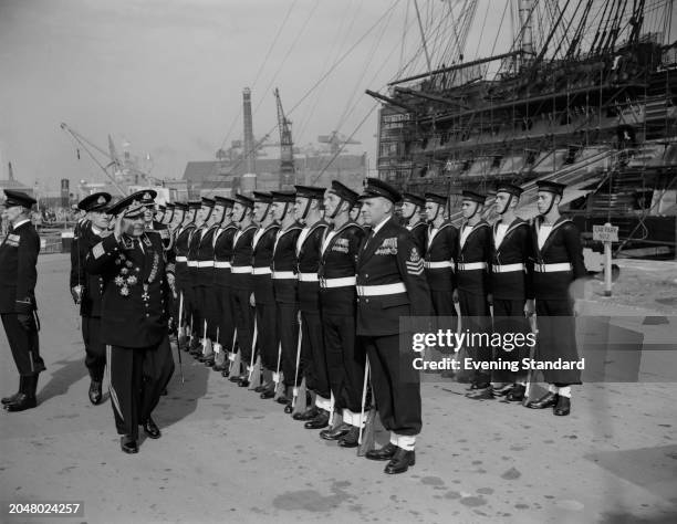 Arseny Grigoryevich Golovko inspects a British guard of honour by sailors of HMS Victory at Portsmouth, Hampshire, October 21st 1955. HMS Victory can...