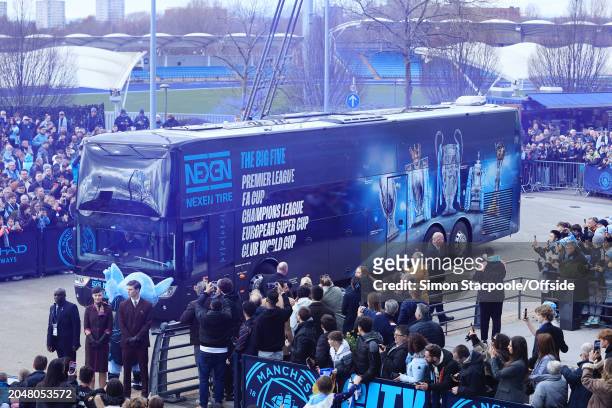 The Manchester City team bus arrives for the Premier League match between Manchester City and Manchester United at Etihad Stadium on March 3, 2024 in...