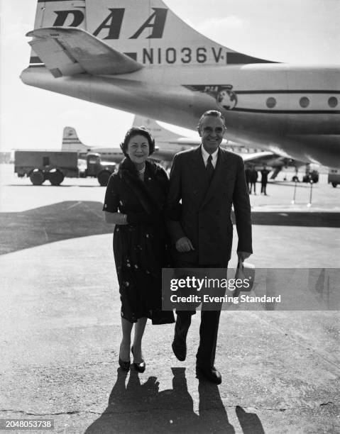 New York Governor Averell Harriman with his wife, art collector and First Lady of New York, Marie Norton Harriman , London Airport, July 13th 1955.