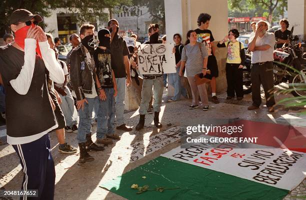 Young Brazilian "punks" protest infront of the Italian consulate in Rio de Janeiro, Brazil on August 20, 2001. They are protesting against the death...