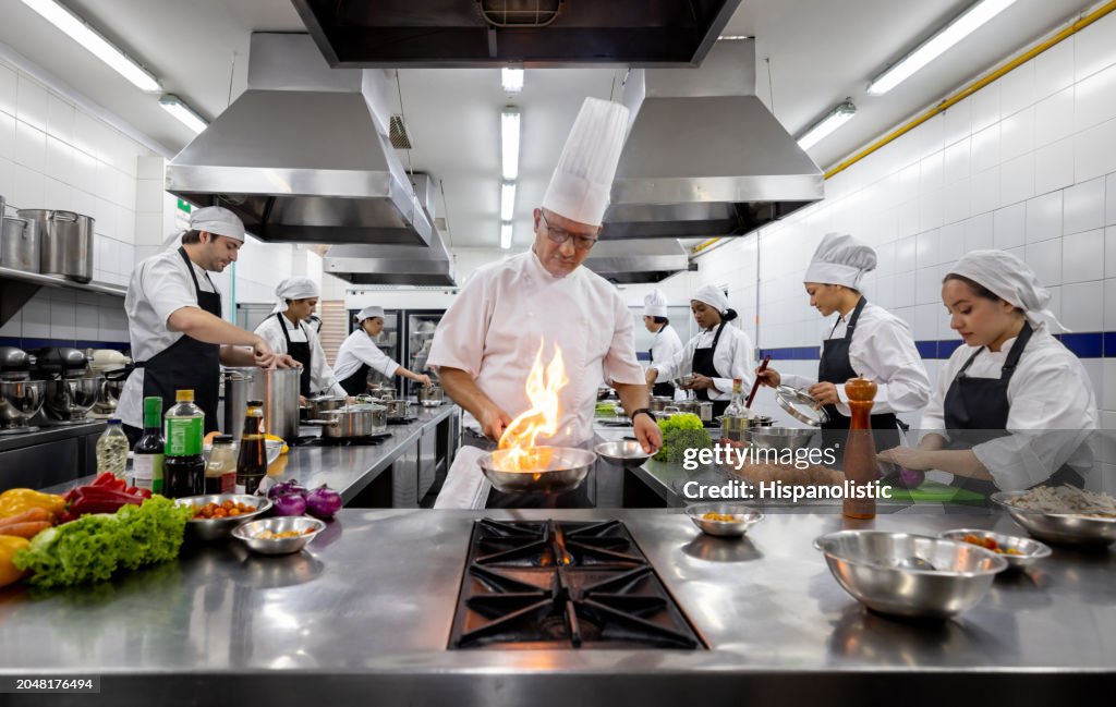 Chef in cooking class with a group of university students