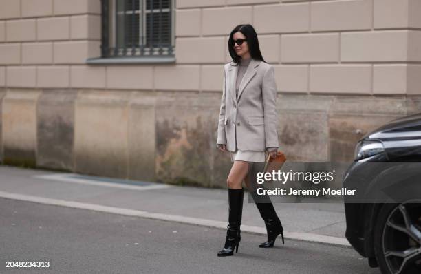 Leo Eberlin seen wearing YSL brown tortoise sunglasses, Leo Mathild diamond jewelry / diamond rings, Allude x Leo Mathild beige cashmere wool knit...