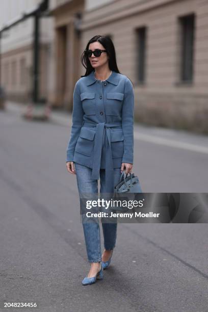 Leo Eberlin seen wearing Bottega Veneta black sunglasses, Leo Mathild diamond jewelry / diamond rings, Allude x Leo Mathild blue cashmere wool...