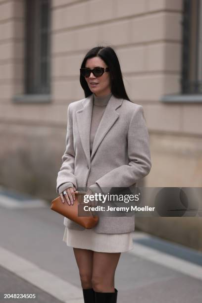 Leo Eberlin seen wearing YSL brown tortoise sunglasses, Leo Mathild diamond jewelry / diamond rings, Allude x Leo Mathild beige cashmere wool knit...