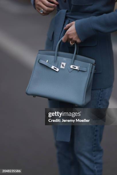 Leo Eberlin seen wearing Leo Mathild diamond jewelry, Leo Mathild x Allude blue cashmere wool cardigan jacket, Zara blue denim straight leg jeans /...