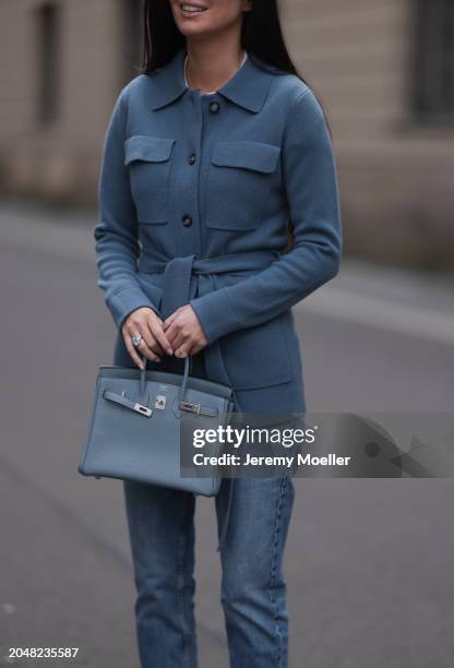 Leo Eberlin seen wearing Leo Mathild diamond jewelry, Leo Mathild x Allude blue cashmere wool cardigan jacket, Zara blue denim straight leg jeans /...