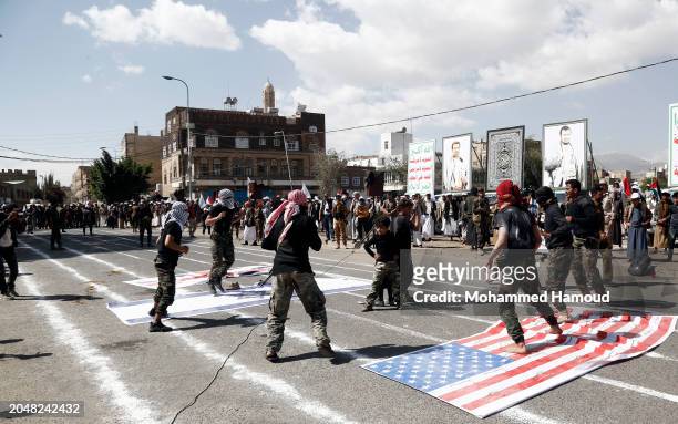 Yemen's Houthi fighters perform self-defense skills during a parade staged in solidarity with Palestinians and against Israel's war on the people of...