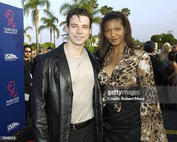 Actor Christopher Showerman and stuntwoman Marjean Holden attend the 3rd Annual Taurus World Stunt Awards at Paramount Studios June 1, 2003 in...