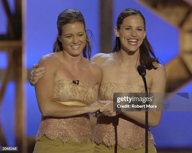 Actress Jennifer Garner and her stunt double Shanna Duggins present the "Best Overall Stunt by a Woman" award on stage during the 3rd Annual Taurus...