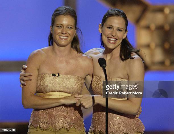 Actress Jennifer Garner and her stunt double Shanna Duggins present the "Best Overall Stunt by a Woman" award on stage during the 3rd Annual Taurus...