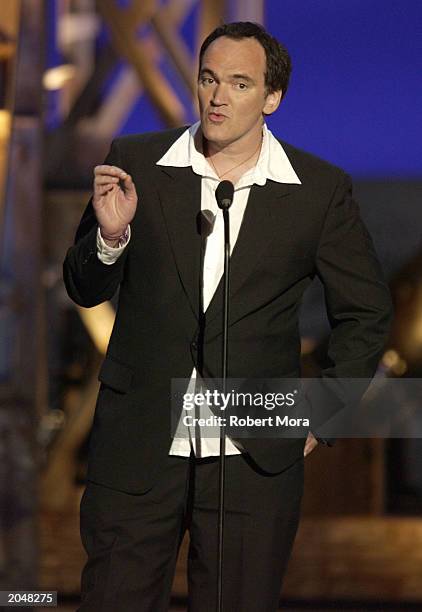 Director Quentin Tarantino presents the "Best Overall Stunt by a Man" award on stage during the 3rd Annual Taurus World Stunt Awards at Paramount...