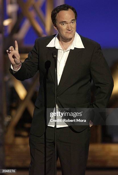 Director Quentin Tarantino presents the "Best Overall Stunt by a Man" award on stage during the 3rd Annual Taurus World Stunt Awards at Paramount...