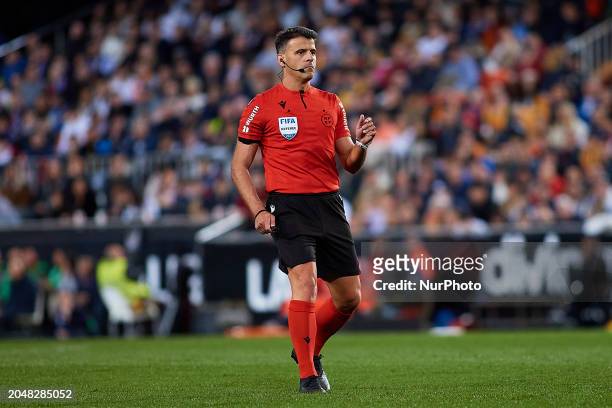 Referee Jesus Gil Manzano is looking on during the LaLiga EA Sports match between Valencia CF and Real Madrid at Mestalla Stadium in Valencia, Spain,...