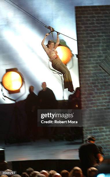 Stuntwoman Shanna Duggins drops onto the stage to present the "Best Overall Stunt by a Woman" award during the 3rd Annual Taurus World Stunt Awards...