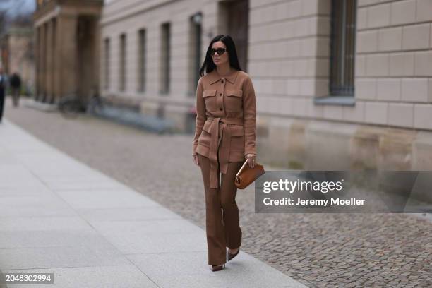 Leo Eberlin seen wearing YSL brown tortoise sunglasses, Leo Mathild diamond jewelry, Allude x Leo Mathild brown cashmere wool cardigan jacket, Zara...