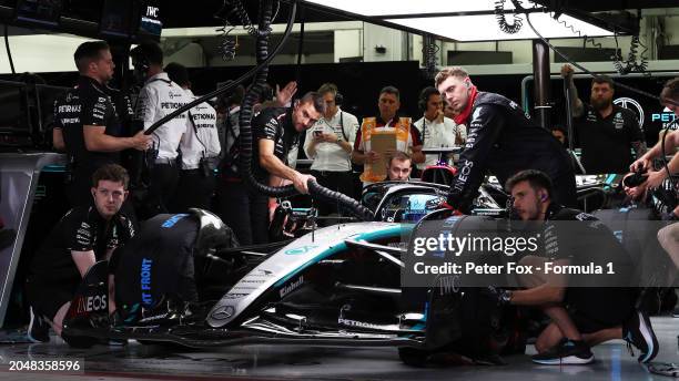 George Russell of Great Britain and Mercedes prepares to drive in the garage during practice ahead of the F1 Grand Prix of Bahrain at Bahrain...