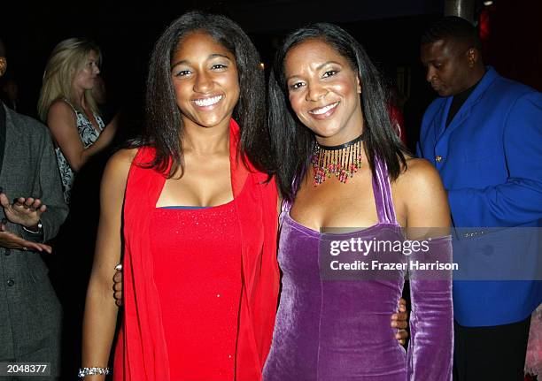 Stuntwoman Mia Jacobs and actress April Weeden-Washington mingle during the after party for the 3rd Annual Taurus World Stunt Awards at Paramount...