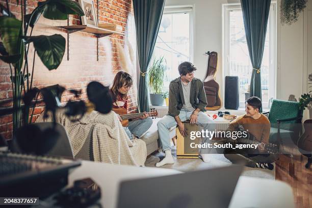 music band rehearsing - cajon drum stock pictures, royalty-free photos & images