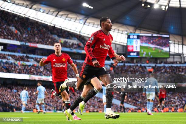 Marcus Rashford of Manchester United celebrates after scoring a goal to make it 0-1 during the Premier League match between Manchester City and...