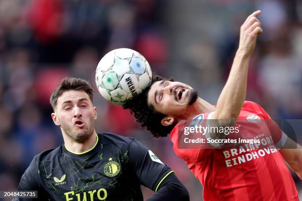 Santiago Gimenez of Feyenoord, Andre Ramalho of PSV during the Dutch Eredivisie match between PSV v Feyenoord at the Philips Stadium on March 3, 2024...