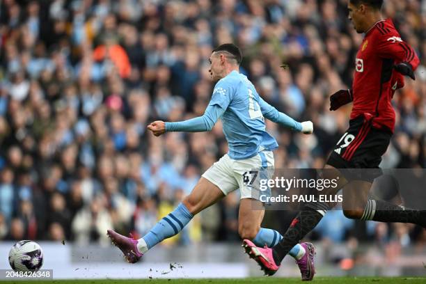 Manchester City's English midfielder Phil Foden has an unsuccessful attempt during the English Premier League football match between Manchester City...