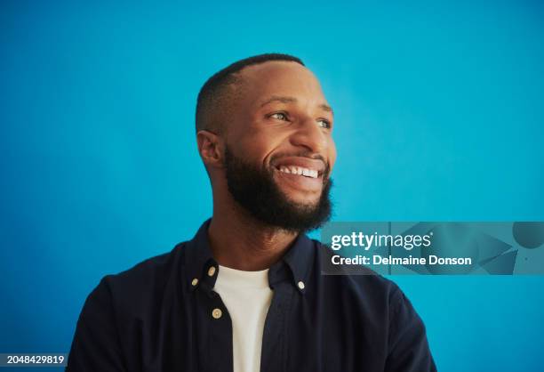 portrait of a handsome young black man smiling - facial hair stock pictures, royalty-free photos & images