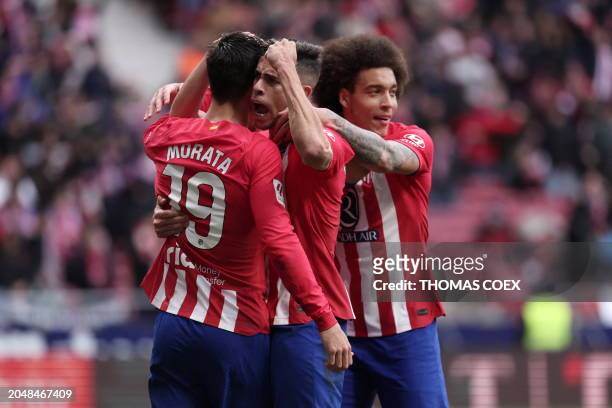 Atletico Madrid's Spanish forward Alvaro Morata celebrates scoring his team's second goal with teammates during the Spanish league football match...