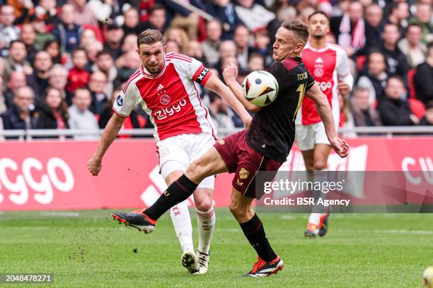 Jordan Henderson of AFC Ajax shoots, Jens Toornstra of FC Utrecht during the Dutch Eredivisie match between AFC Ajax and FC Utrecht at Johan Cruijff...