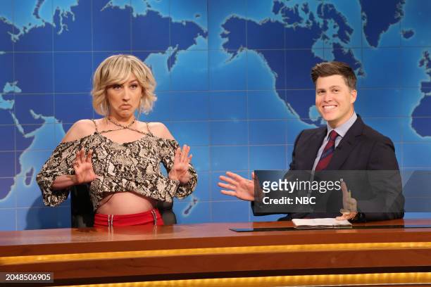 Episode 1857 -- Pictured: Heidi Gardner as Woman Who Is Aging Gracefully and anchor Colin Jost during Weekend Update on Saturday, March 2, 2024 --